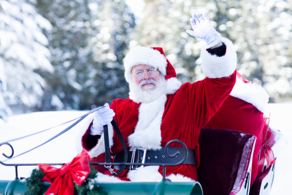 santa waves goodbye after saving christmas